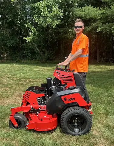 Shaark Landscaping crew on commercial mower