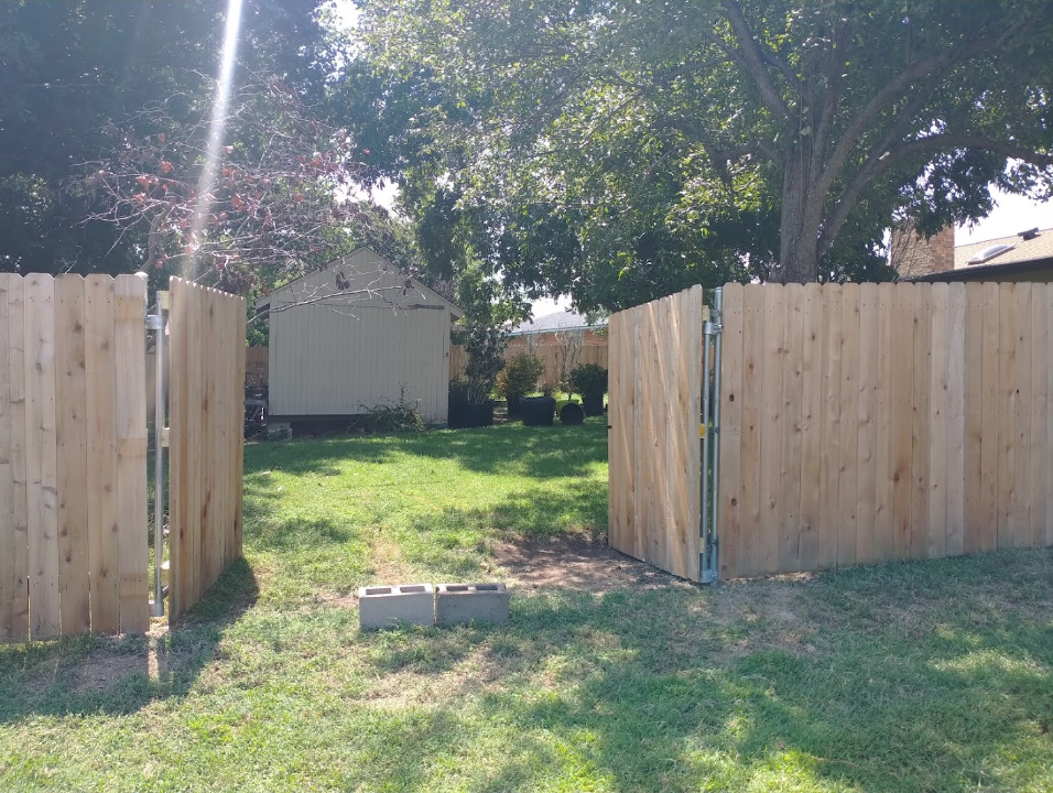 Newly installed wood privacy fence